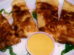 CHICKEN, SHRIMP, CRAWFISH QUESADILLA